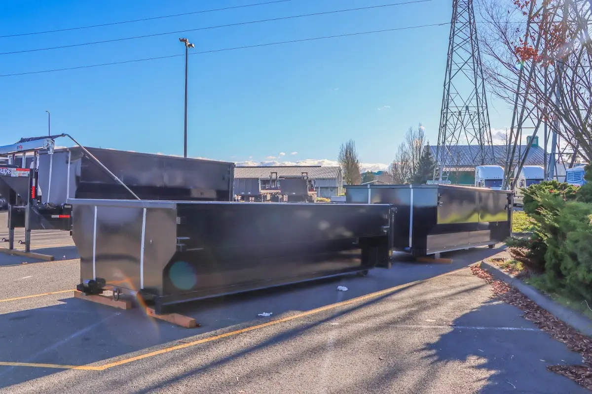 Roll-off dumpster ready for waste disposal at job site for Construction Dumpster Rental in Manchester